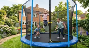 Group of children playing safely on a 10ft family trampoline with enclosure netting