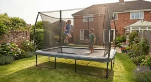 High-quality rectangular trampoline featuring a secure safety net enclosure for children