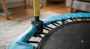 Detailed view showing the robust frame and elastic bands of an indoor toddler trampoline with handle.