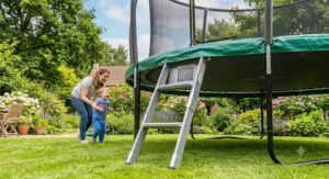 A heavy duty 14ft trampoline showing the sturdy access ladder for easy entry.