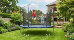 Children enjoying outdoor exercise on a spacious 14ft trampoline in the UK