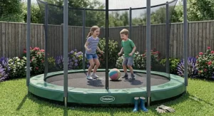 Two children playing safely inside the net enclosure of a 12ft family trampoline.