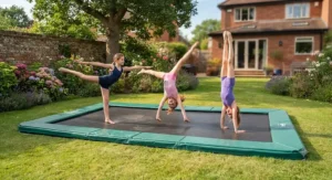 Children practising gymnastics routines and balance on an in-ground rectangular trampoline