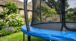 Close up of safety enclosure netting and padding on a 12ft trampoline