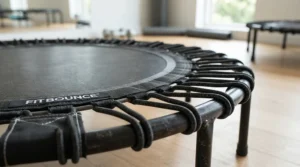 A quiet bungee cord rebounder for lymphatic drainage being used for daily circulation.