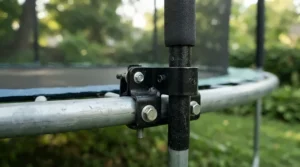 Showing how a balance bar for fitness trampoline secures to a rebounder frame