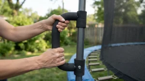 Comfortable foam grips on a stability bar for seniors rebounding during a morning workout.